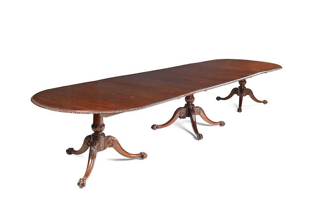 Appraisal: An early th century mahogany triple pedestal dining table by