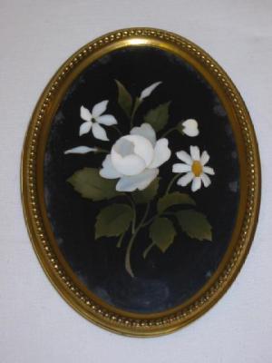 Appraisal: A PIETRA DURA OVAL PANEL inlaid with flowers and leaves