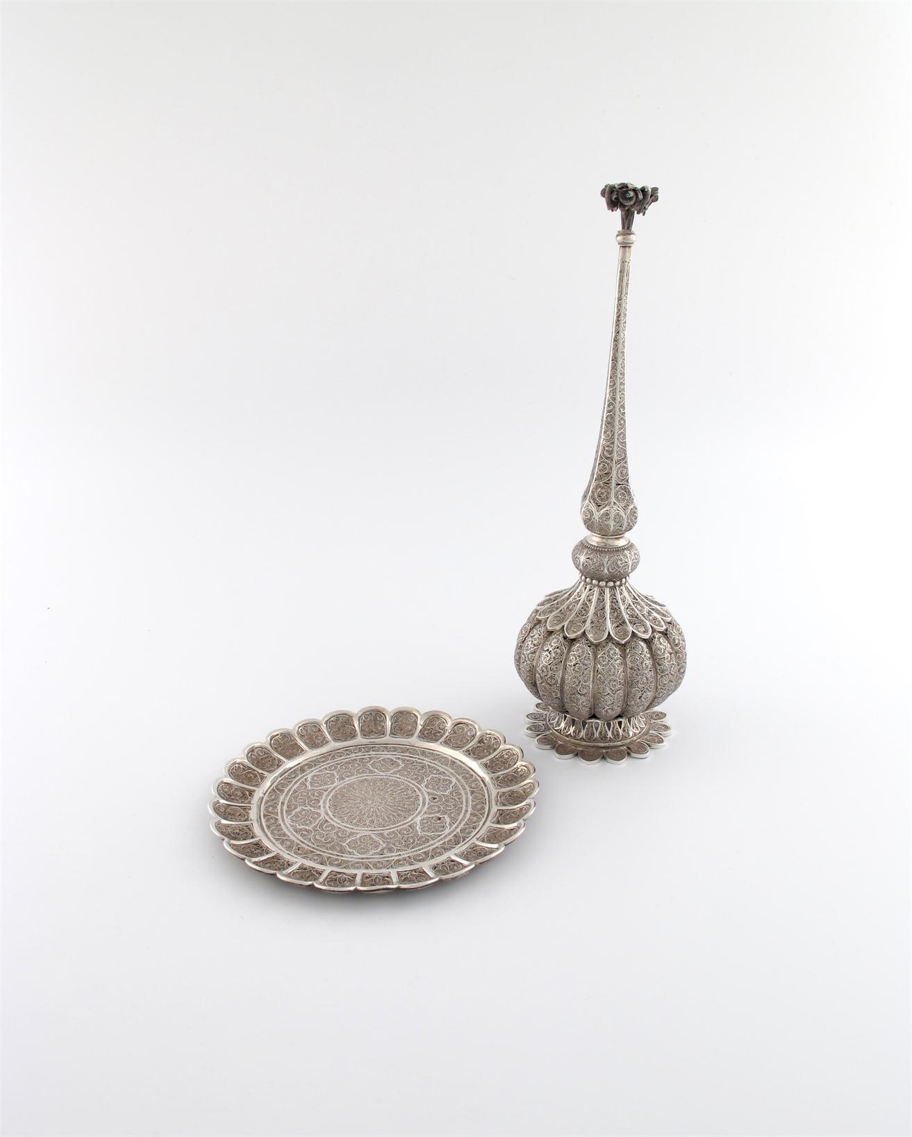 Appraisal: A silver filigree rose water sprinkler and stand