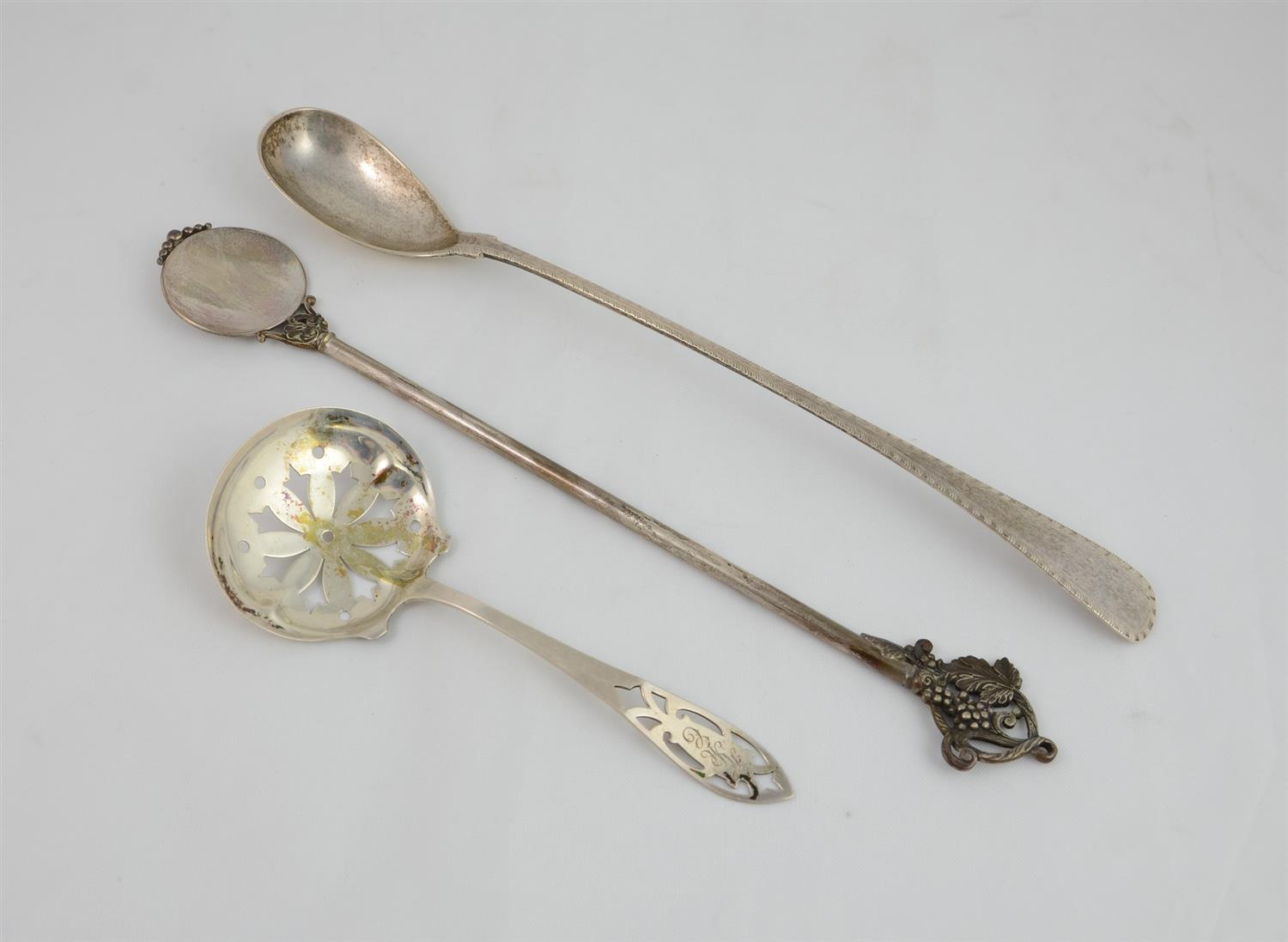 Appraisal: Sterling silver drink stirrer with grapevine cluster handle monogram maker's