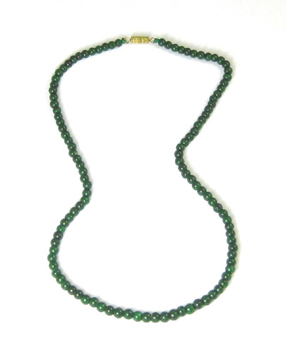 Appraisal: GREEN JADE BEAD NECKLACE - inches in length and strung