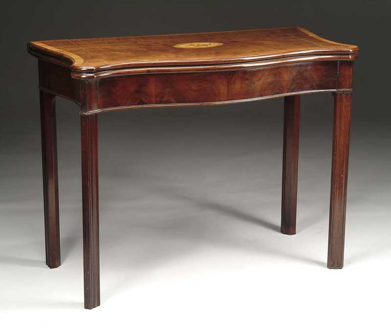 Appraisal: MAHOGANY GEORGE II SERPENTINE FRONT CARD TABLE The fold over