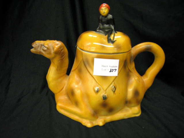 Appraisal: Figural Porcelain Teapot seated camel frustrated rider