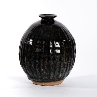 Appraisal: Katharine Pleydell-Bouverie - a dark brown globular vase ridged sides