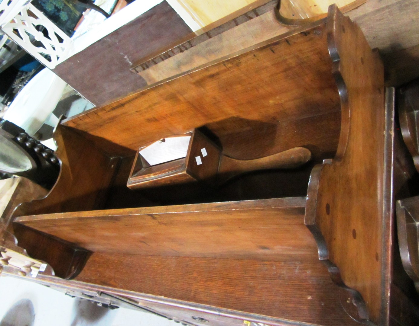 Appraisal: A th century walnut wall shelf with towel rail together