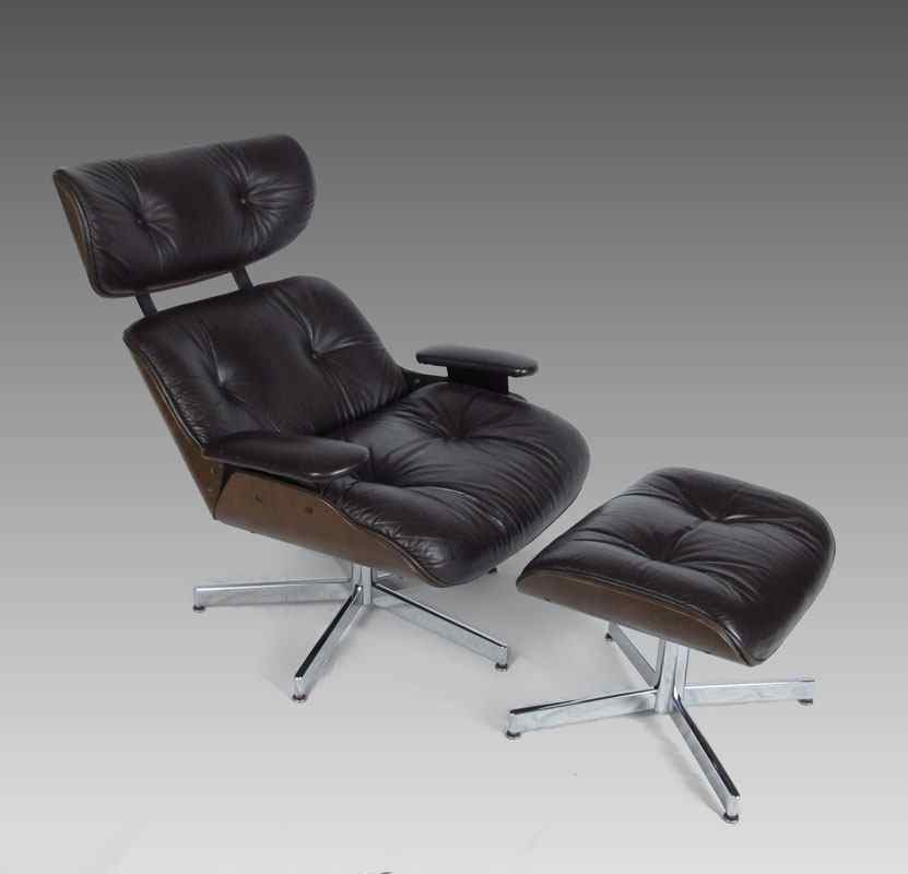 Appraisal: EAMES STYLE LOUNGE CHAIR AND OTTOMAN Chocolate brown leather Chair