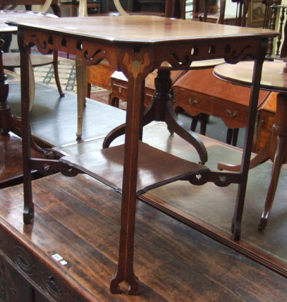 Appraisal: An Art Nouveau inlaid mahogany occasional table the canted square