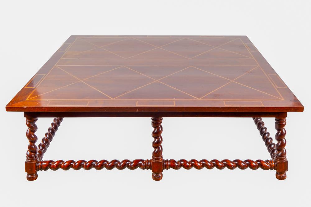 Appraisal: CARVED INLAID MAHOGANY COFFEE TABLEProvenance A Michael Smith installation inches