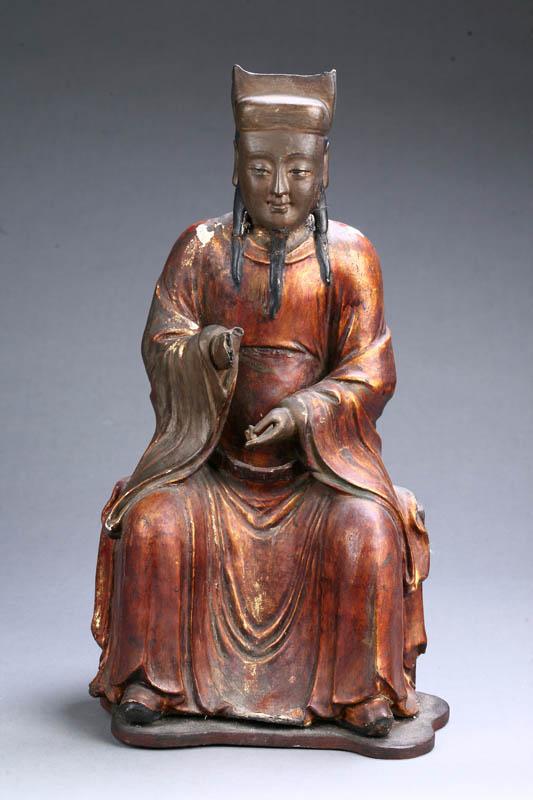 Appraisal: CARVED SEATED FIGURE China early th century hardwood Confucian figure