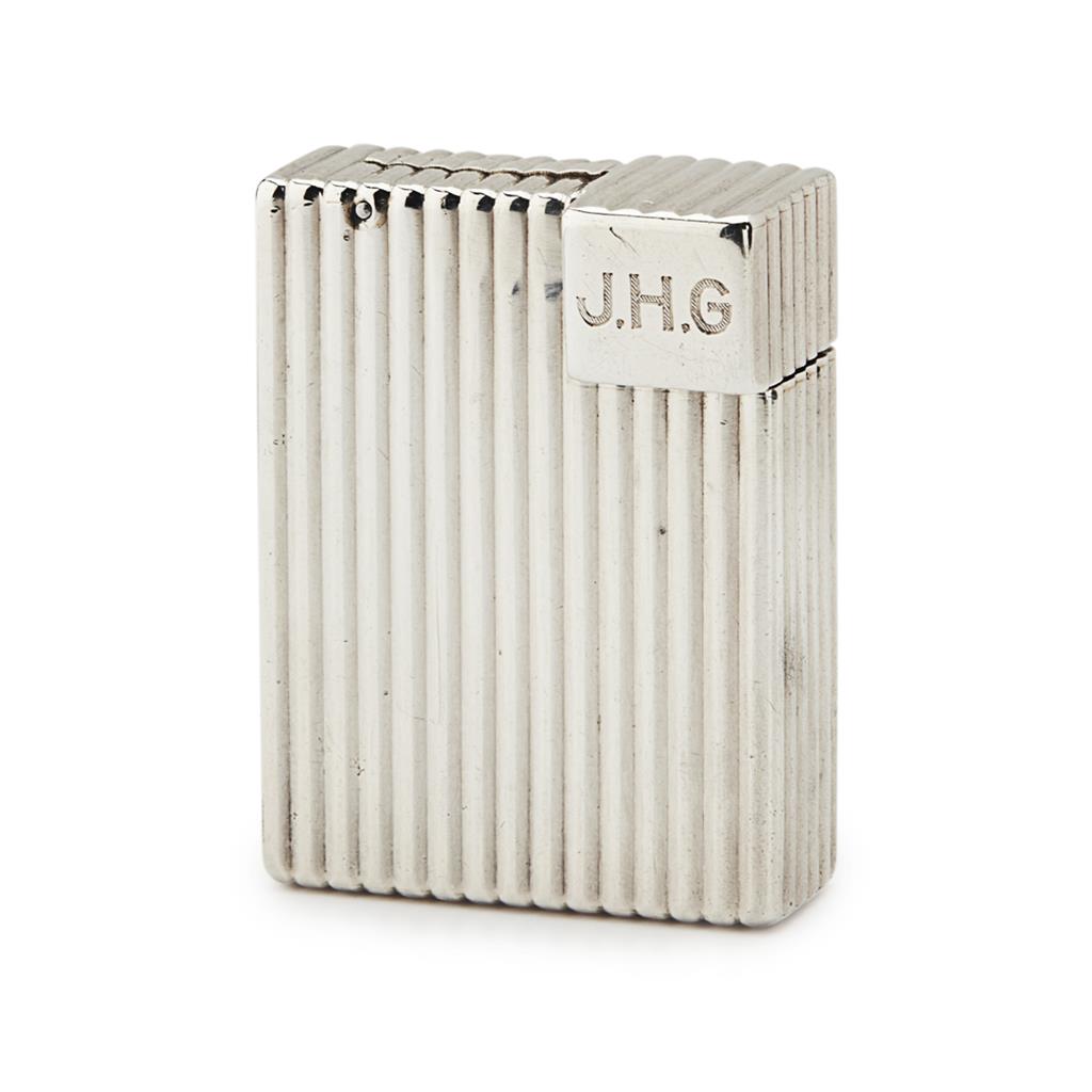 Appraisal: CARTIER - A silver lighter marked Paris ribbed body engraved