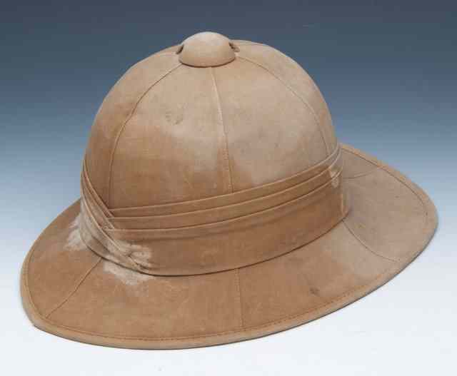 Appraisal: A MILITARY PITH HELMET the inside stamped with a War