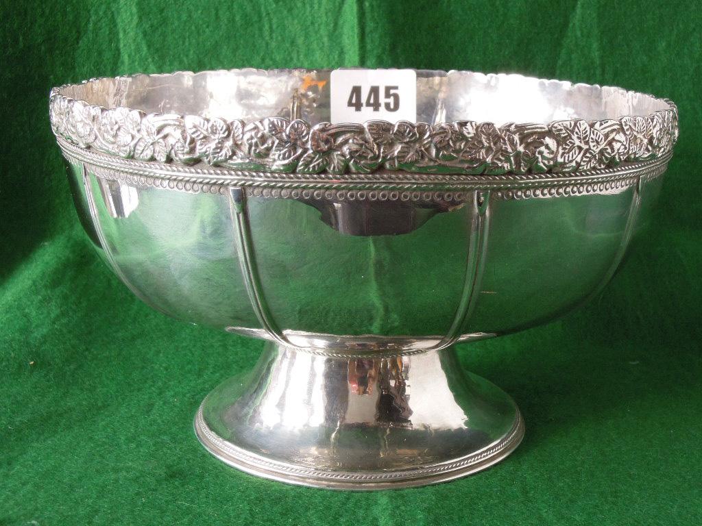 Appraisal: A silver bowl cm diameter with leafy rim raised on