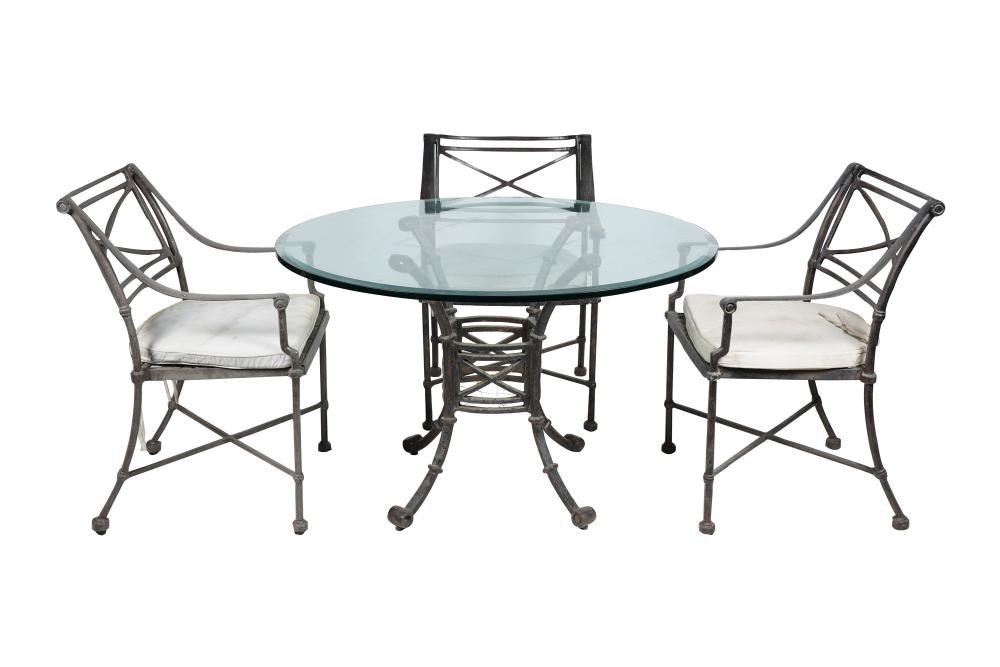 Appraisal: IRON PATIO TABLE FOUR CHAIRSthe table inches diameter each chair