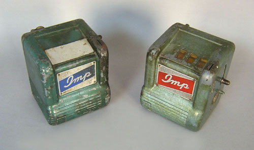 Appraisal: Two Imp gum dispensers h x w