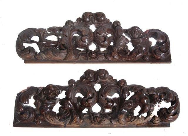 Appraisal: A PAIR OF ANTIQUE CARVED WOOD CRESTING RAILS of open