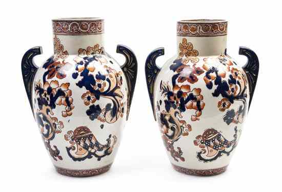 Appraisal: A Pair of English Pottery Vases of handled ovoid form