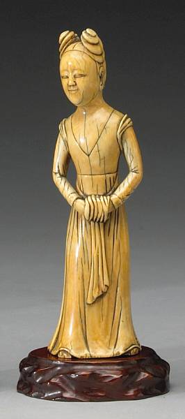 Appraisal: A carved ivory beauty th Century The slender figure with