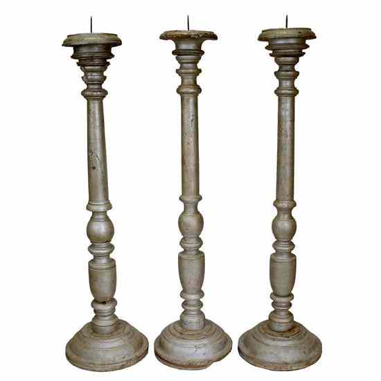 Appraisal: A Set of Indo-Portuguese Silver Painted Teak Candlesticks circa each