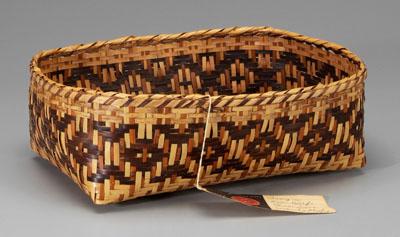 Appraisal: Eva Wolfe river cane basket wrapped oak split rim serrated