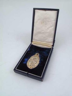 Appraisal: An Arts and Crafts silver-gilt Master Printers Association pendant badge