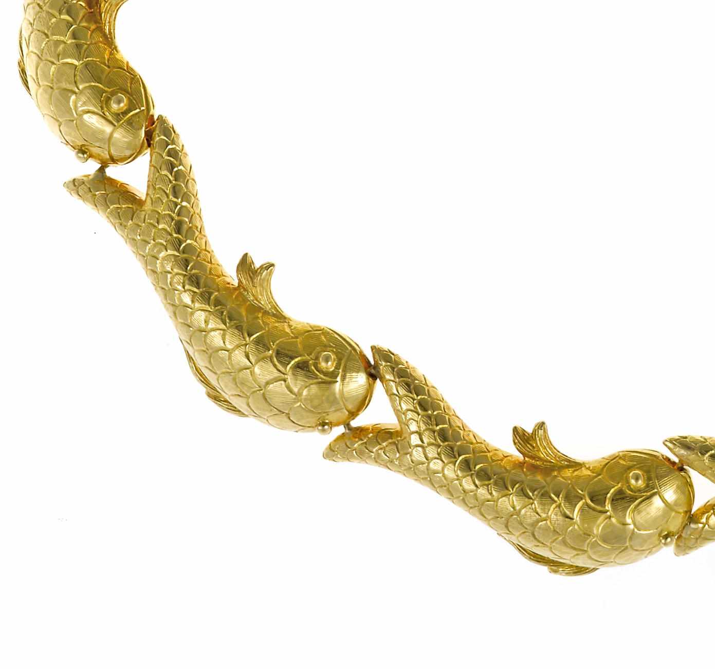 Appraisal: An eighteen karat gold fish necklace weighing approximately grams length