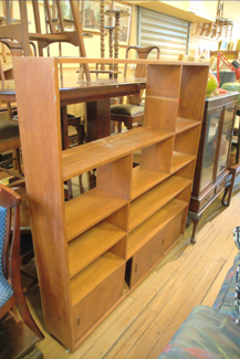 Appraisal: s SOLID TEAK BOOKSHELF WITH SLIDING DOORS