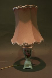 Appraisal: A table lamp with floral decoration