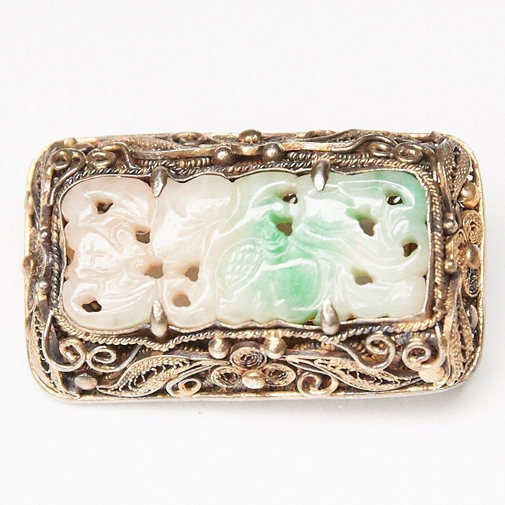 Appraisal: Chinese Silver and Jade Pin Chinese carved jade and silver