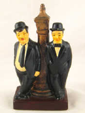 Appraisal: A painted ceramic group of Laurel and Hardy by a