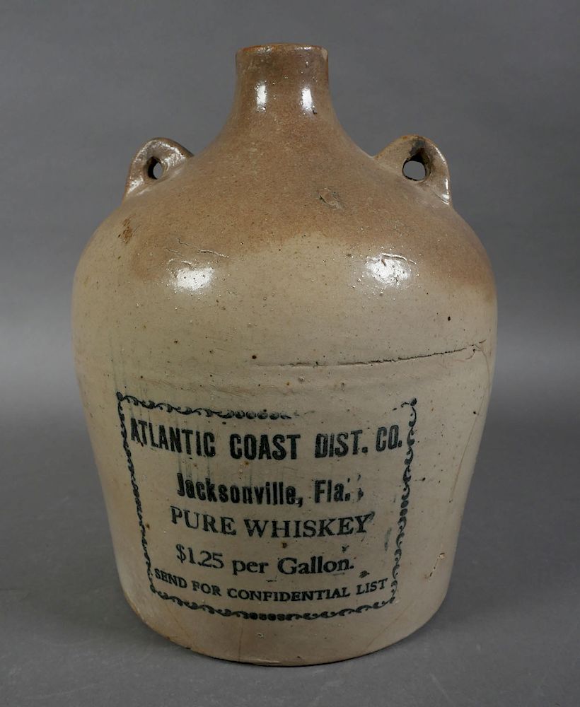 Appraisal: JACKSONVILLE gal Pure Whiskey Jug Antique gallon jug with handle-attachment