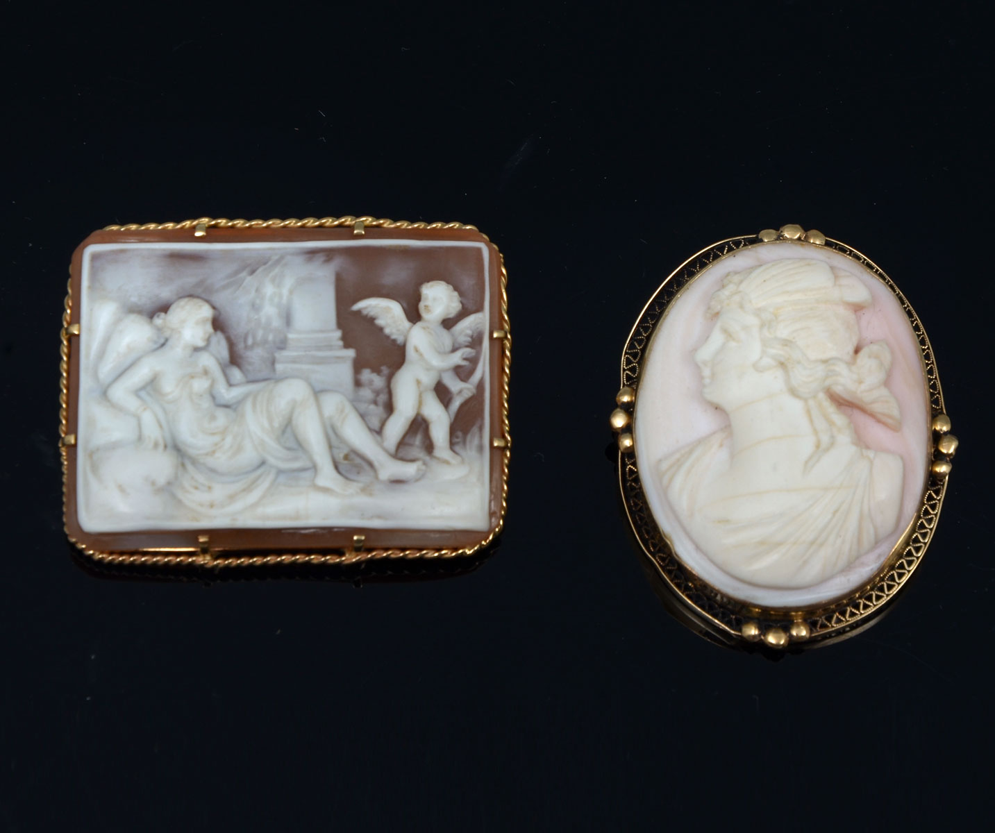 Appraisal: CARVED CAMEO BROOCHES Shell cameo features portrait of beautiful woman