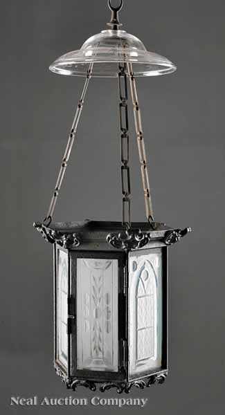 Appraisal: An American Patinated Metal and Cut and Etched Glass Hanging