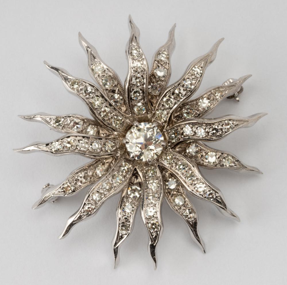 Appraisal: KARAT WHITE GOLD DIAMOND SUNBURST PINcentering one old European-cut diamond