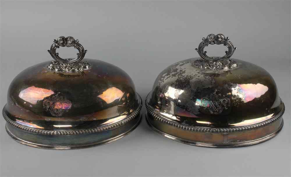 Appraisal: PAIR OF OVAL SHEFFIELD PLATE DISH COVERS the domed covers