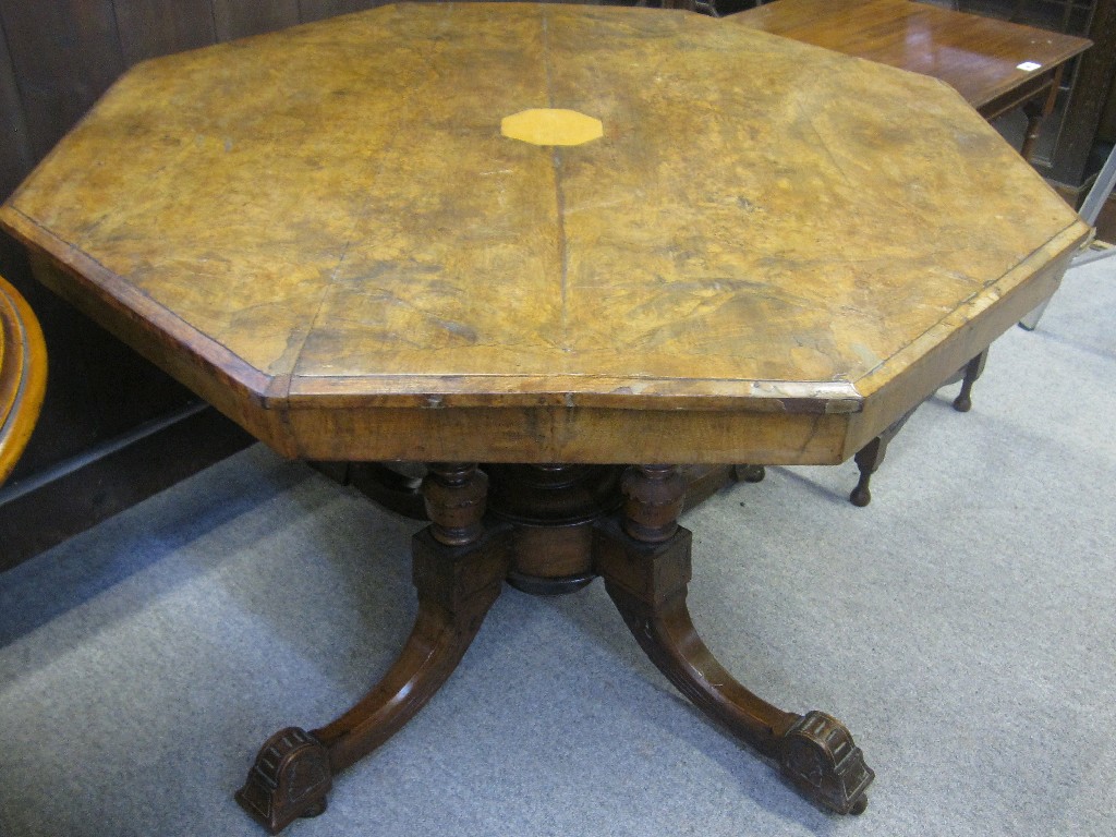 Appraisal: Victorian walnut octagonal centre table