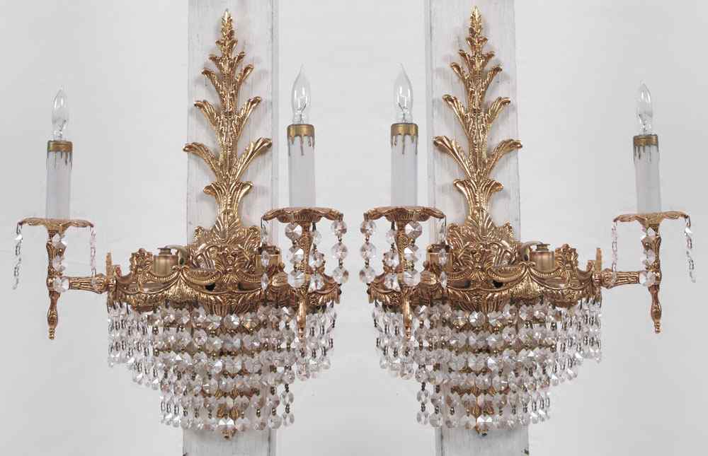 Appraisal: PAIR OF CRYSTAL SCONCES Made in Spain light companions to