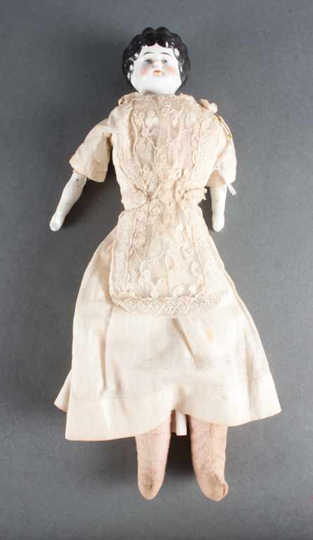 Appraisal: Victorian china head doll with cloth body and lace dress