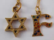 Appraisal: A carat gold Magen David pendant together with a yellow