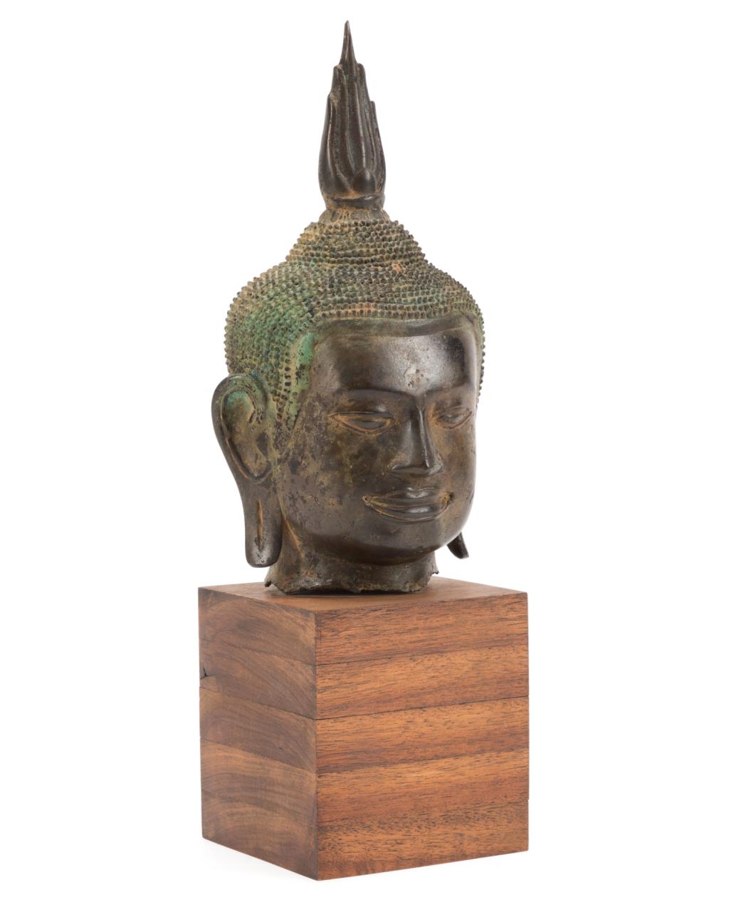 Appraisal: THAI BRONZE BUST OF THE BUDDHA ON WOODEN STAND Thai