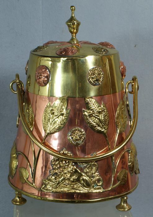 Appraisal: Brass and copper coal bucket with English lions and flowers