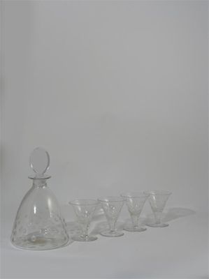 Appraisal: A Stevens Williams Brierley Hill decanter and four glasses designed