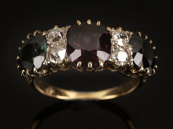 Appraisal: An early th century red spinel green sapphire and diamond