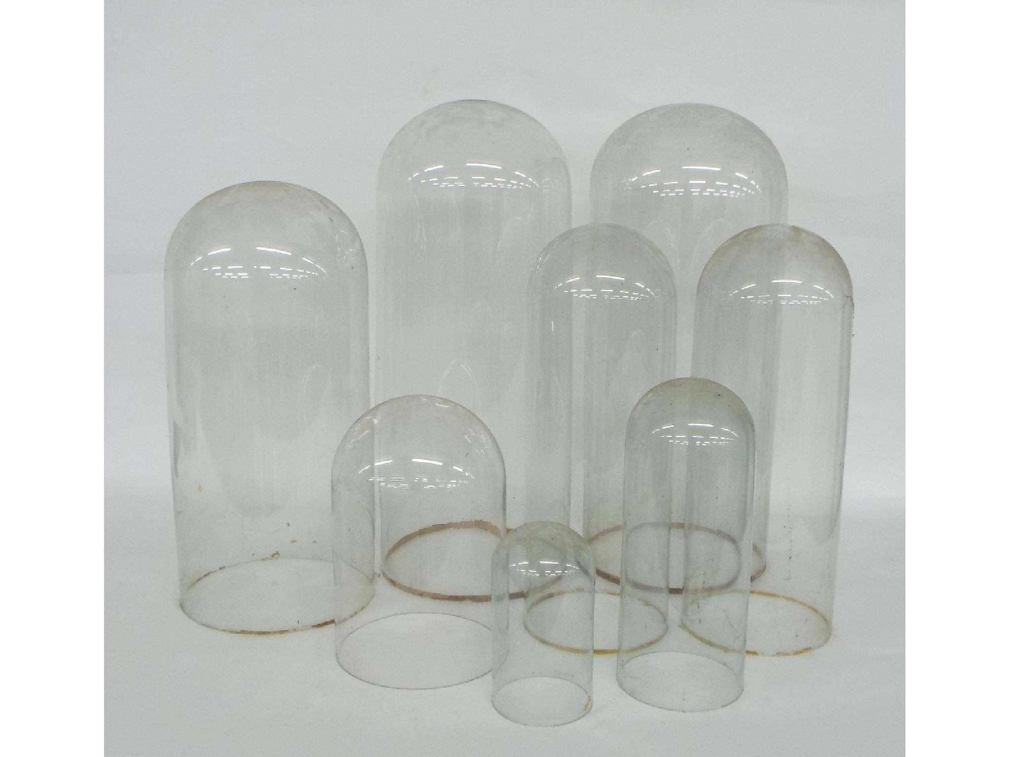 Appraisal: Eight various cylindrical glass domes