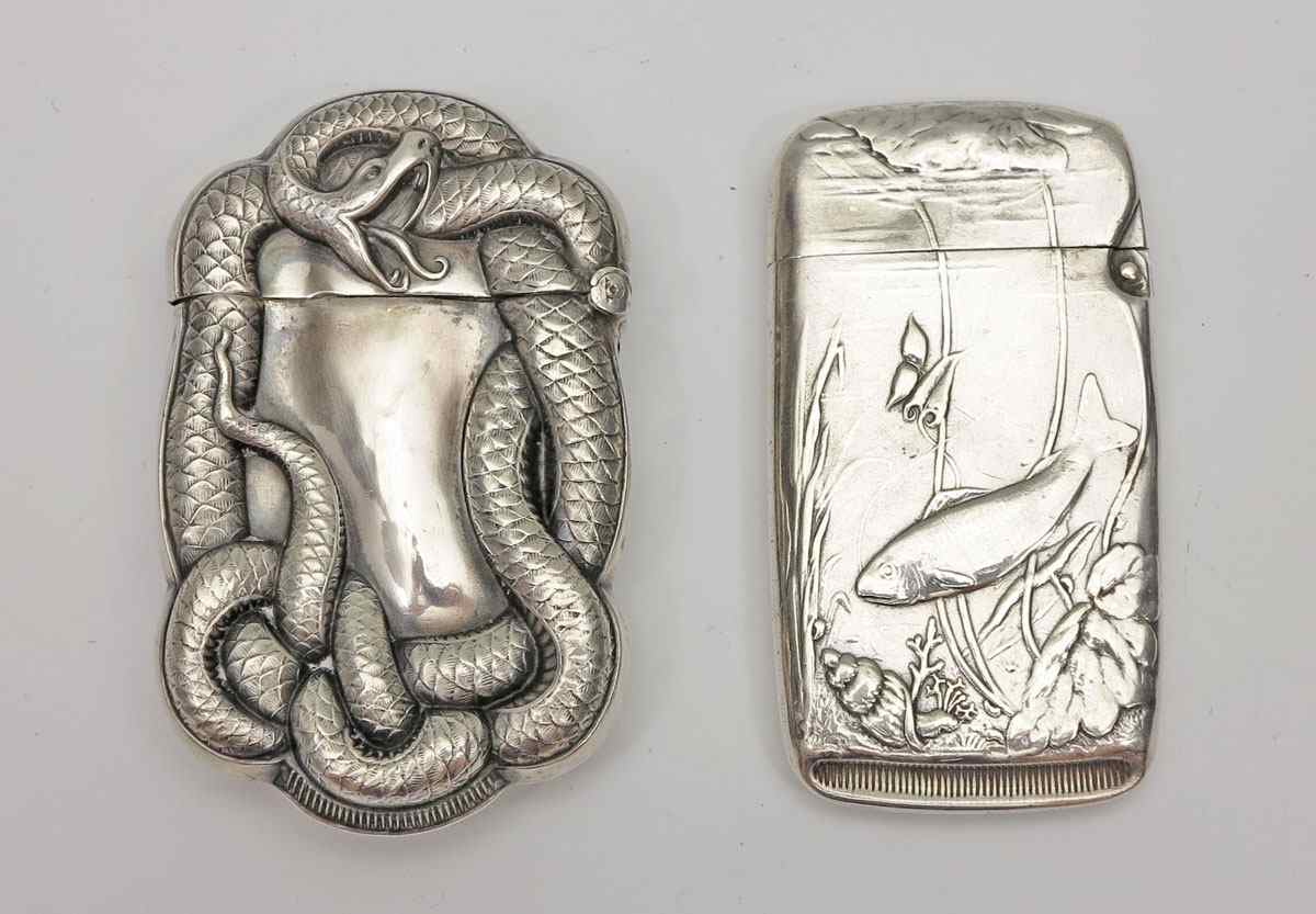 Appraisal: ART NOUVEAU STERLING SILVER MATCH SAFES To include Fish Wallace