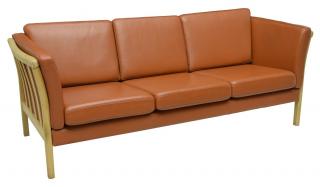 Appraisal: DANISH MODERN LEATHER UPHOLSTERED SOFA Danish modern sofa 's framed