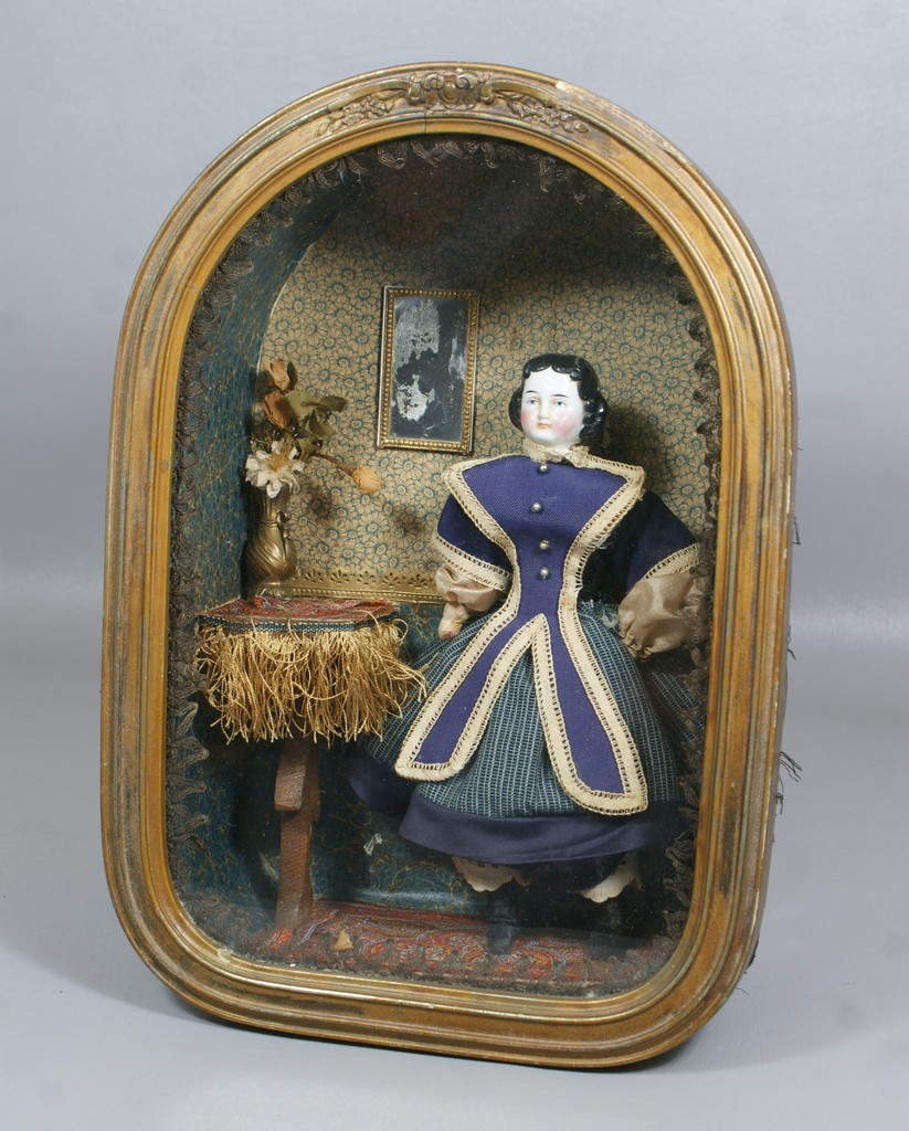 Appraisal: Attractive s Era Vignette Featuring a Glazed China Head doll