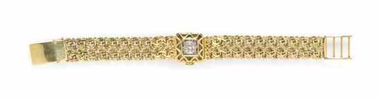 Appraisal: An Karat Yellow Gold and Diamond Surprise Wristwatch Bucherer x