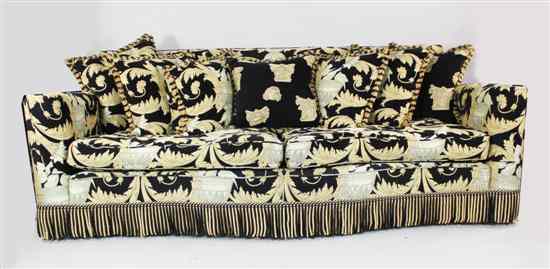 Appraisal: A Duresta serpentine four seater sofa with elaborate acanthus leaf