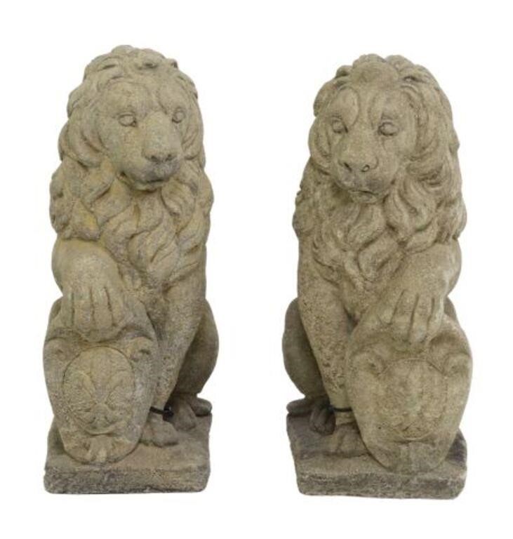 Appraisal: pair Cast stone garden statues Heraldic Lions late th c