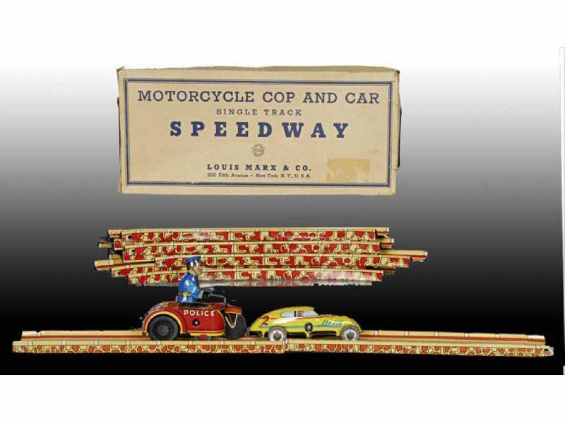 Appraisal: Marx Tin Wind-Up Motorcycle Cop Toy Car Speedway Description Both